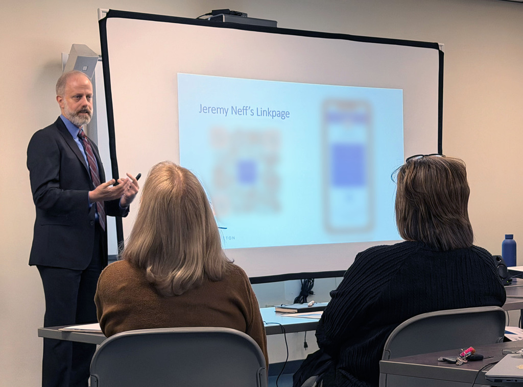 Jeremy Neff from Ennis Britton, an attorney office, presenting to the 36 administrators from districts across the county about the truancy law changes.