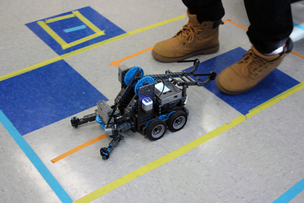 VEX Robot following orange line on the ground.