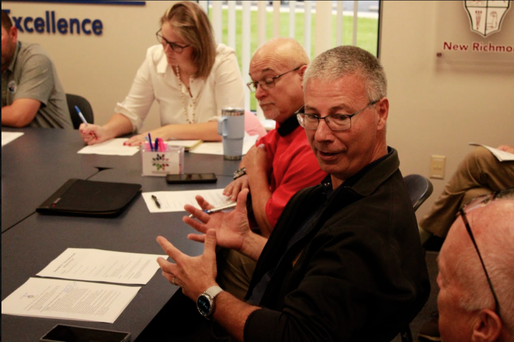 Grant Career Center Principal Barry Dalton discusses the impact of legislation with Clermont County ESC Leadership and Customer Support Liaison Darrell Edwards. 