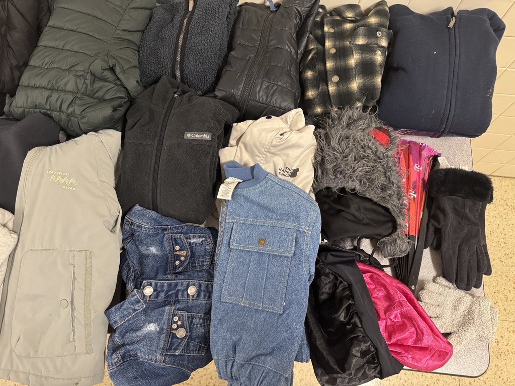 Ten jackets, a hat, a bonnet, an accordion fan, and two pairs of gloves in lost and found