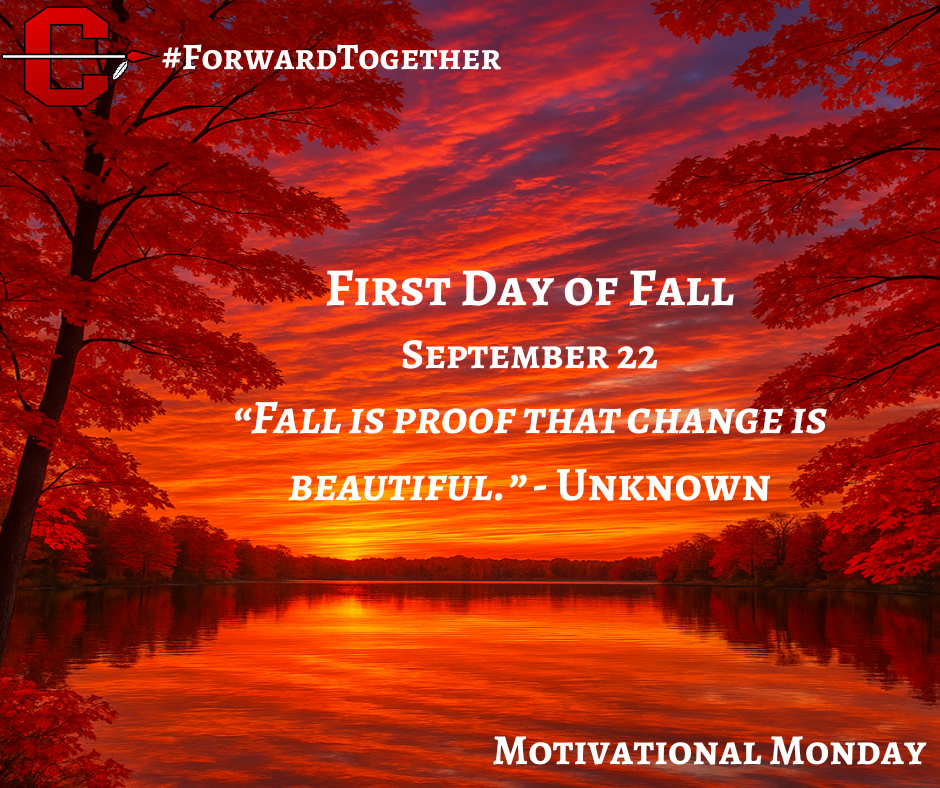 Picture of fall colors in a dusk sky over water.