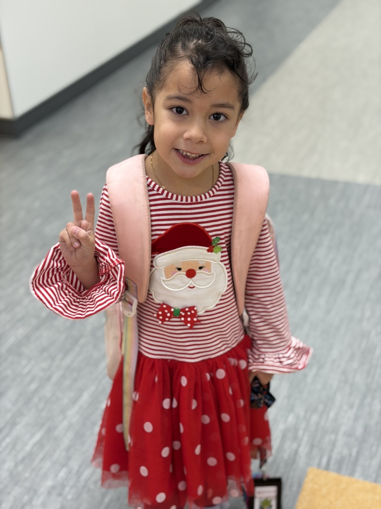 Children dressed as candy canes