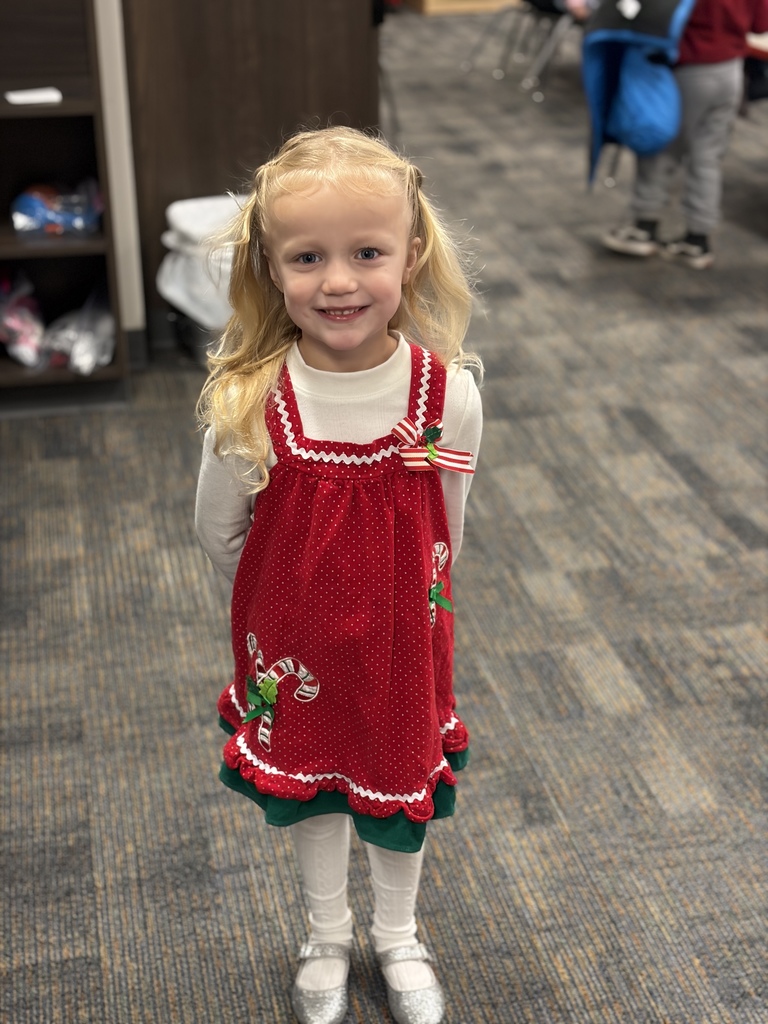 Children dressed as candy canes