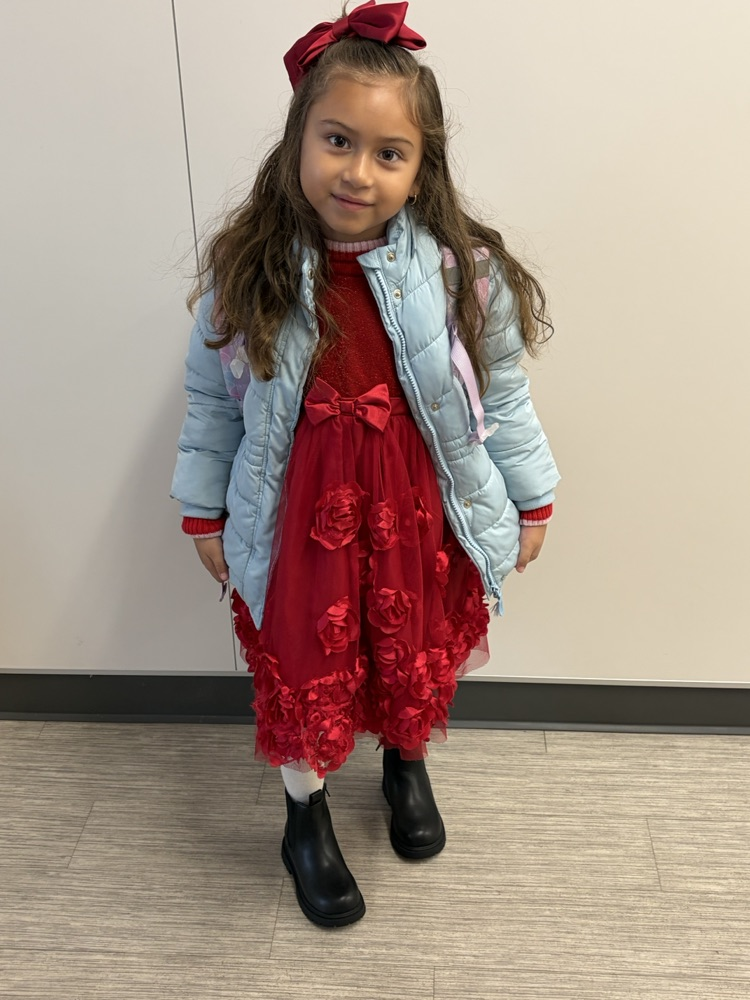 child dressed as a Candy cane