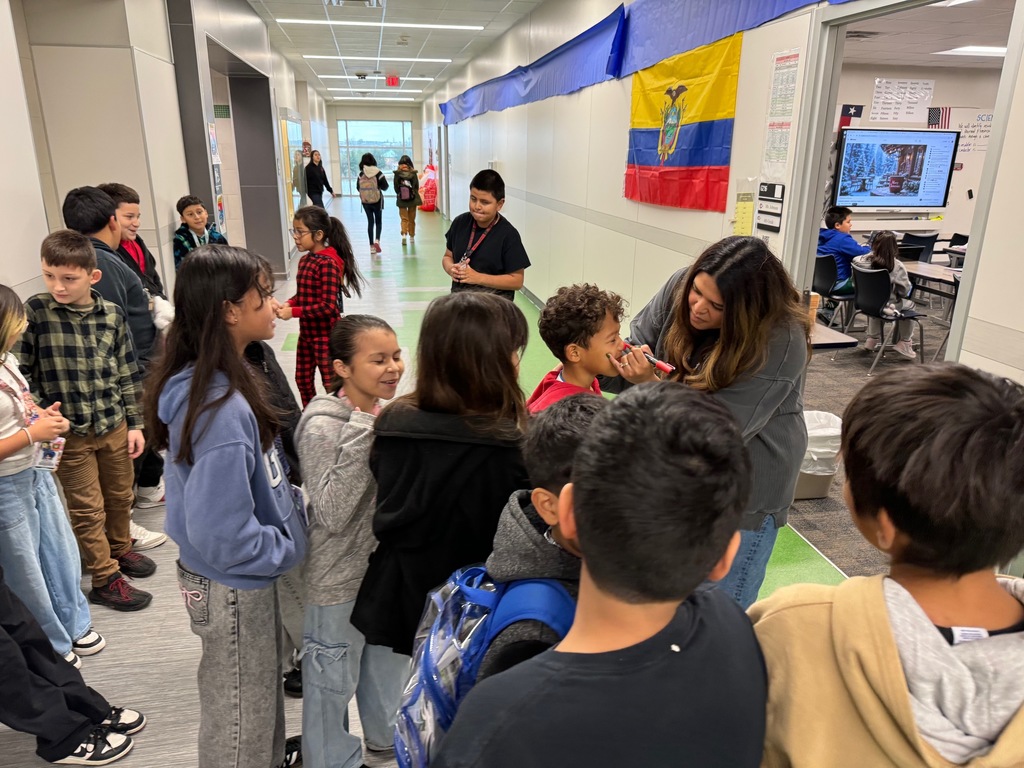 Children getting their face painted for reindeer day