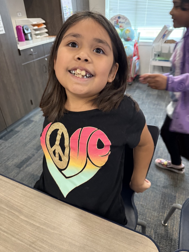 Girl wearing a glitter shirt