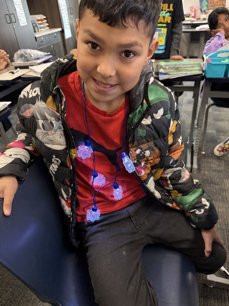 Male child wearing Christmas Light necklace