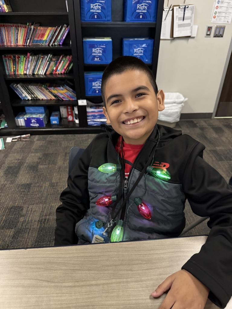 Boy wearing Christmas lights