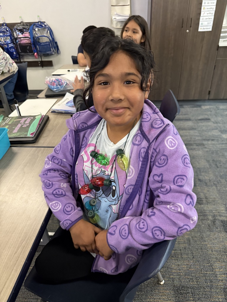 Girl wearing Christmas Lights