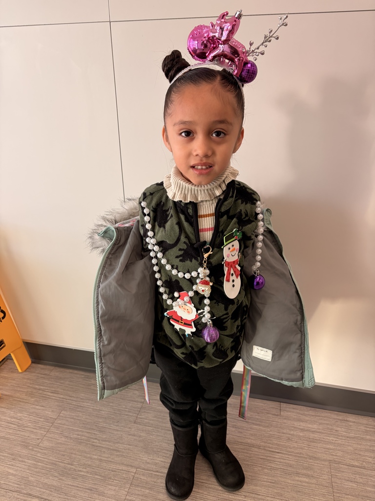 Child wearing Christmas Ugly sweaters