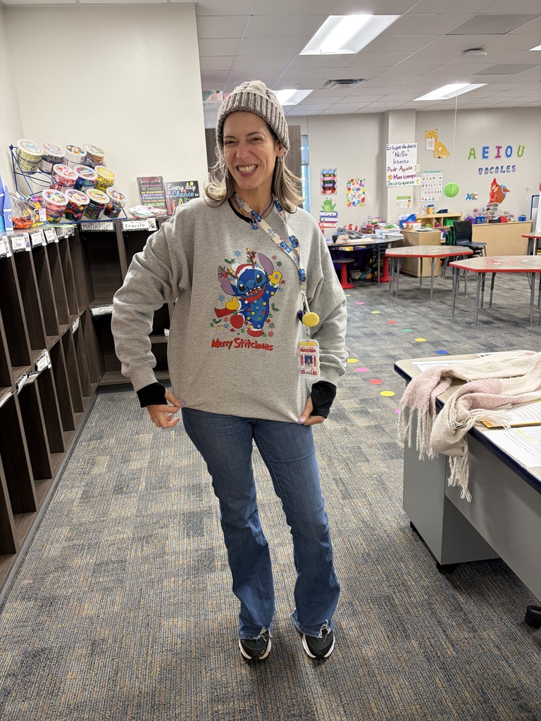 Teacher wearing Christmas Ugly sweaters