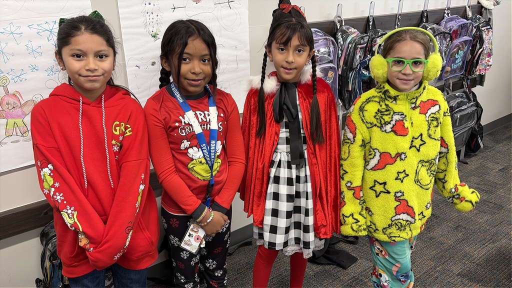 Group of small children dressed as the Grinch