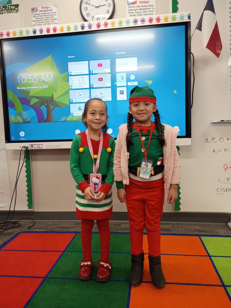 Children dressed as Santa's elves