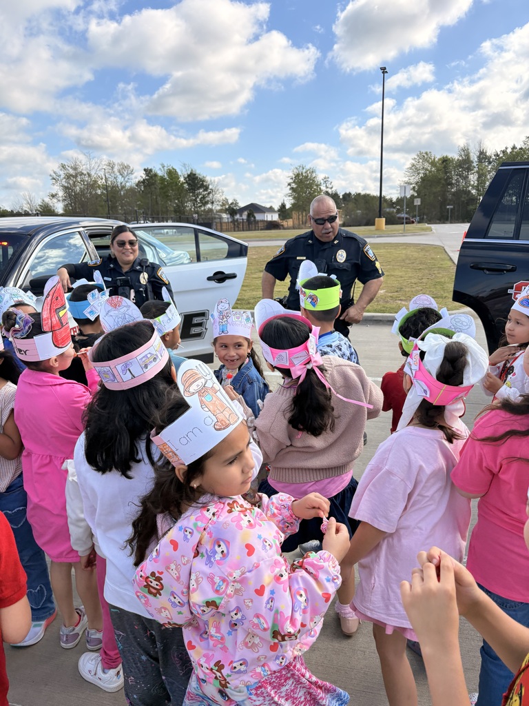 Children talking to a police officer