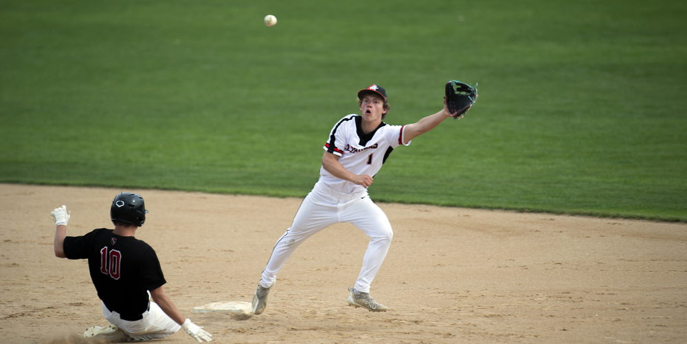 Lyons reaches for a throw