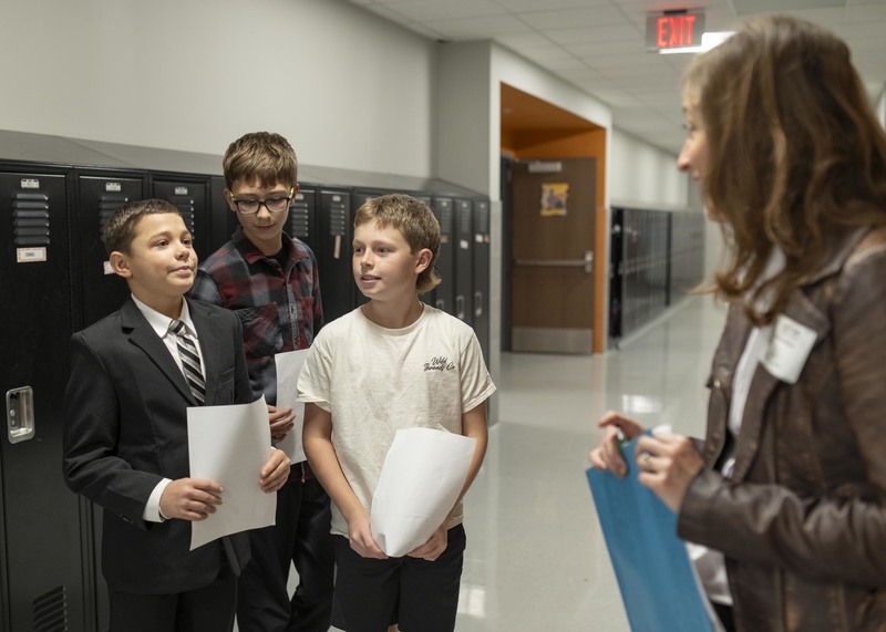 Students with papers