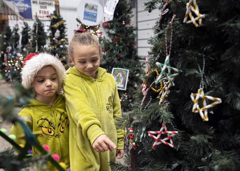 Boy and girl by tree