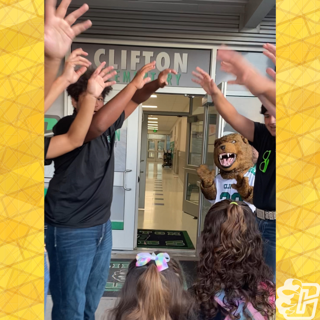 There's No Place Like Homecoming Students entering with Cub Mascot
