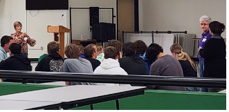 CHS Seniors listen to a representative from the Clifton Education Foundation discuss scholarship opportunities.