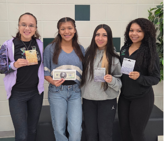 Four CHS students show their drawing winnings from the Clifton Education Foundation FallFest booth.