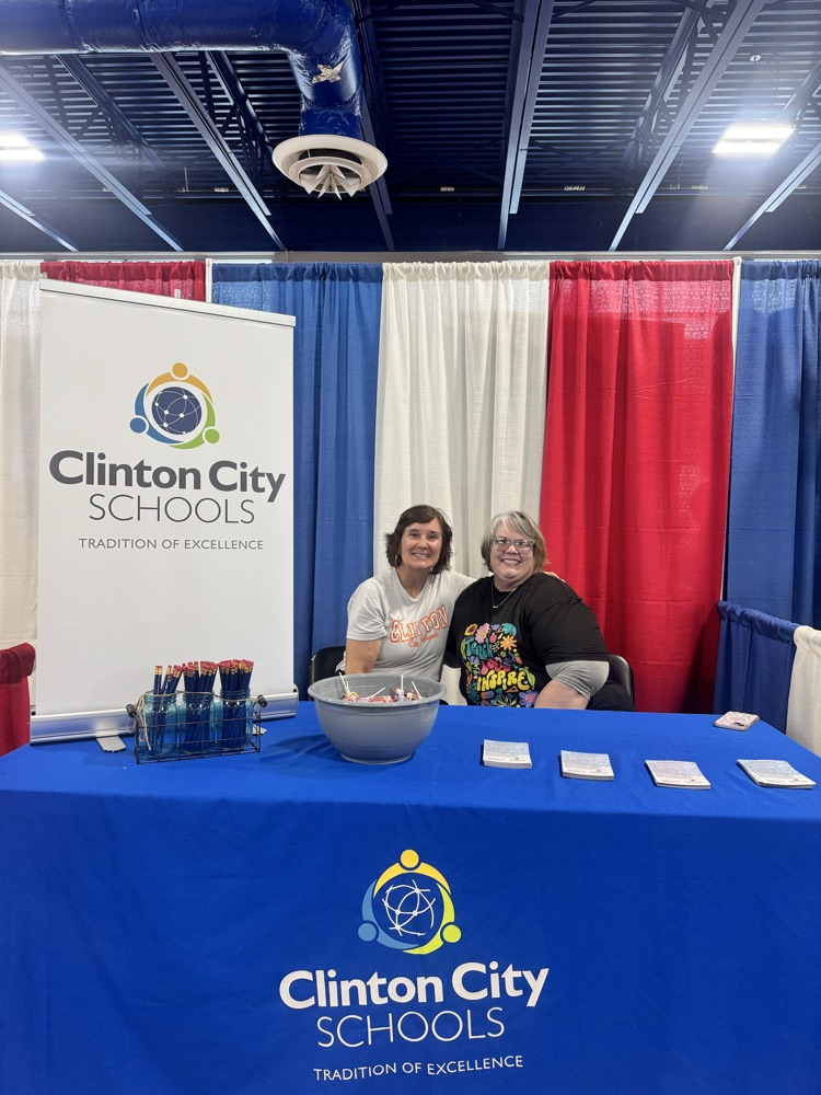 staff members at the fair booth