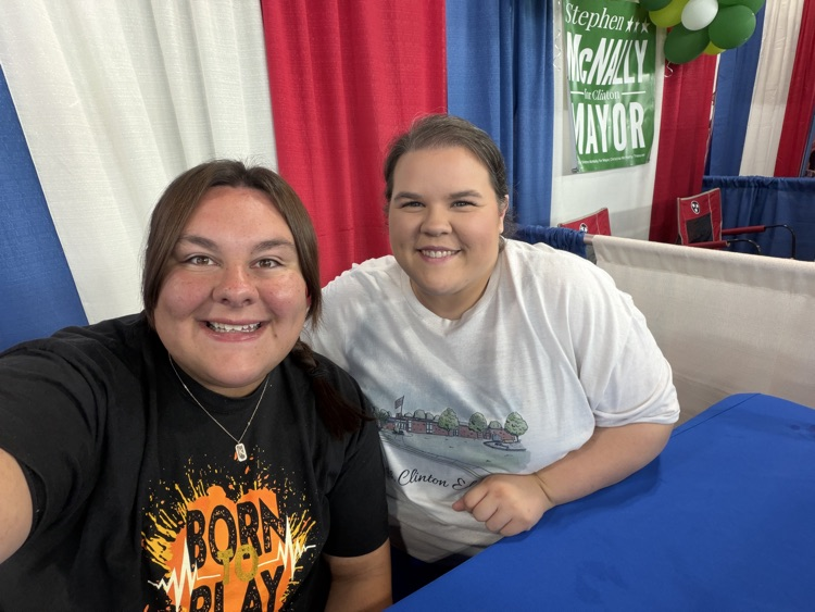 staff members working at the fair booth