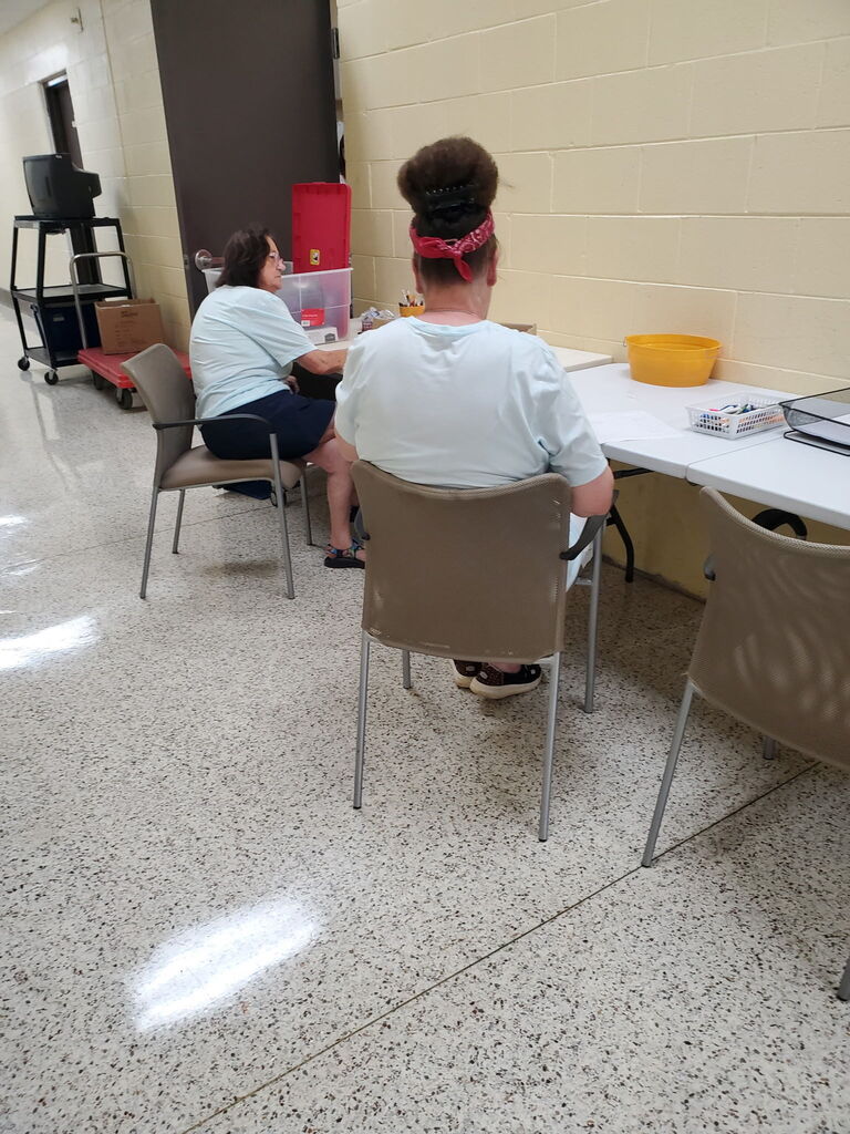 Teachers getting supplies at the Teacher Supply Depot