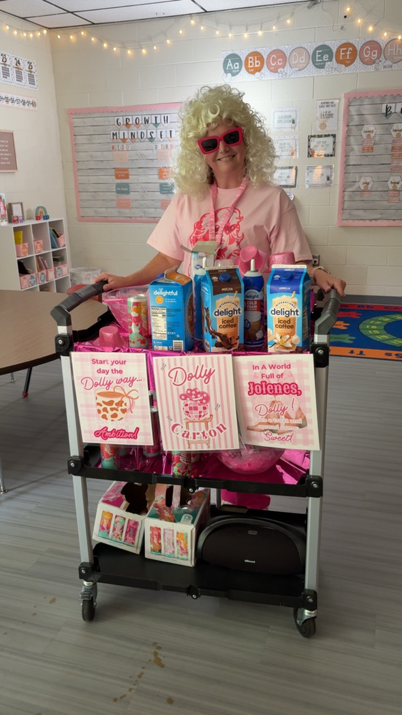 Mrs. Breeden dressed as Dolly and rolling around a Dolly Carton of goodies! 