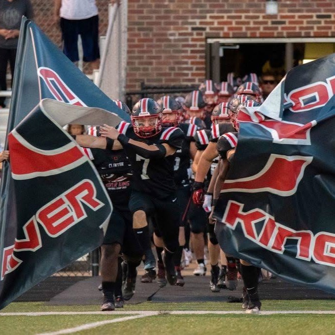 football players breaking out of sign 