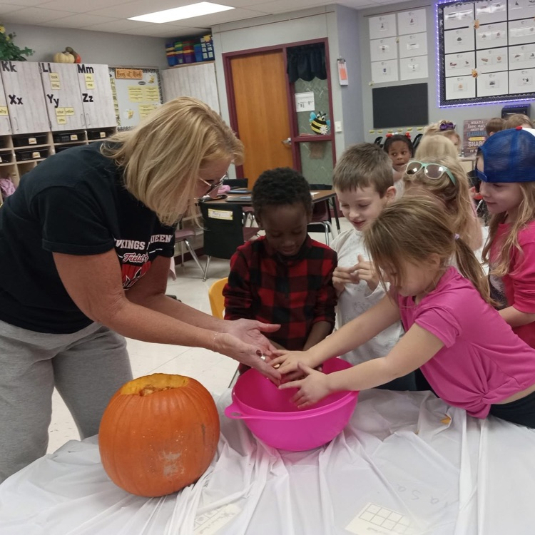 students use senses during pumpkin carving 