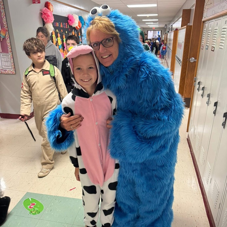 staff and student in halloween costumes