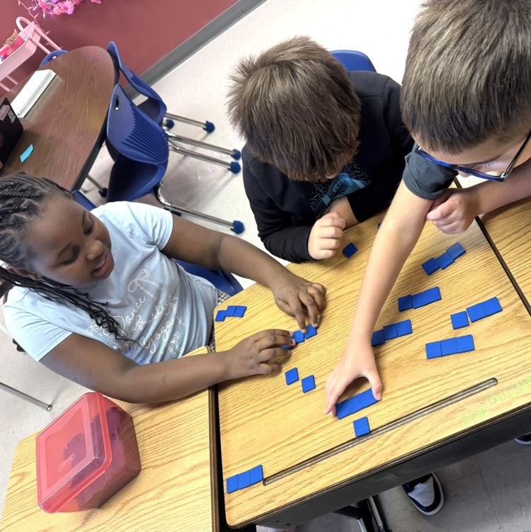 students work together on math task