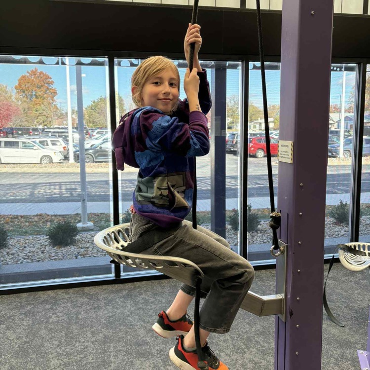 putnam museum - student doing activity 