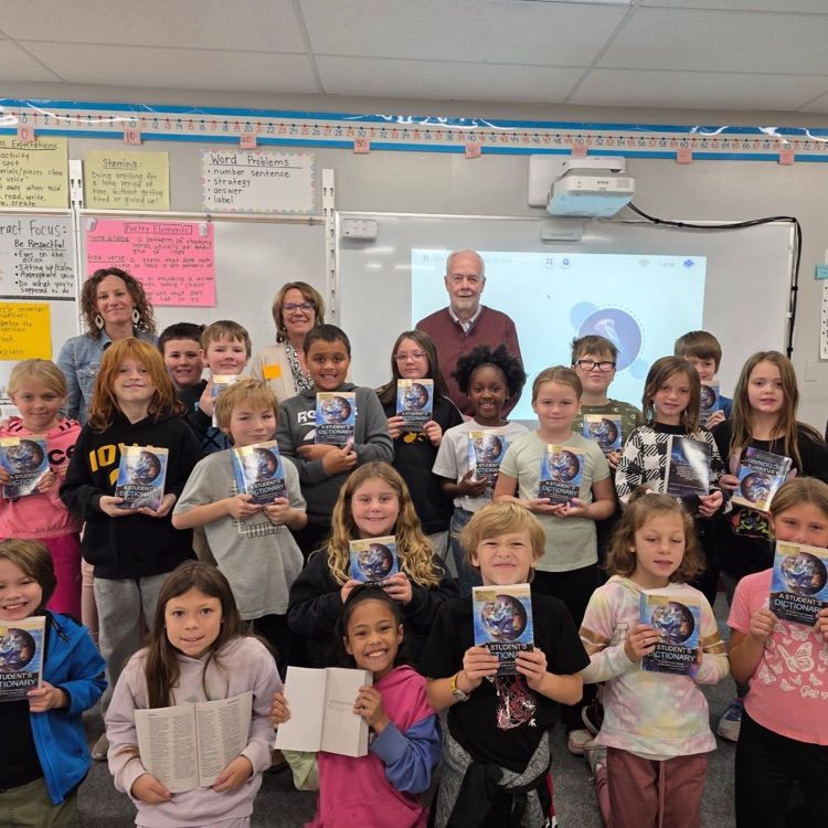 rotary club brings dictionaries to third grade