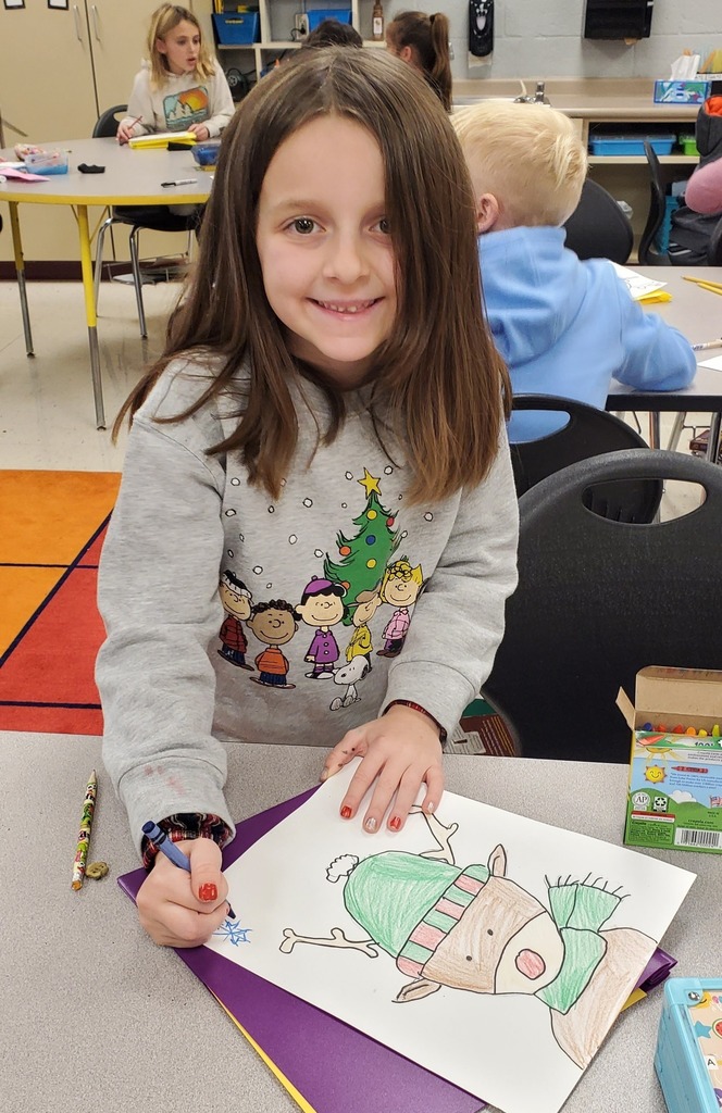 student coloring reindeer art