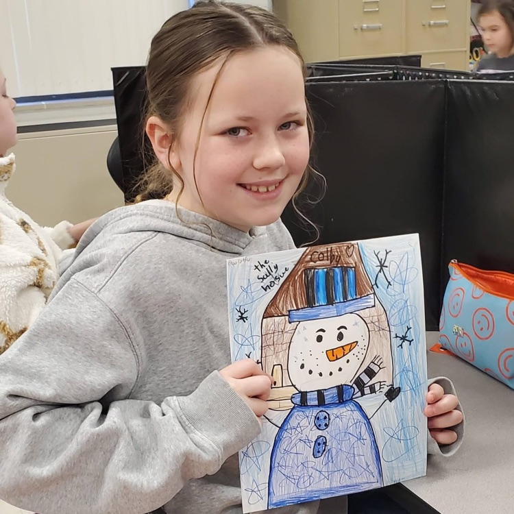 student with snowman artwork