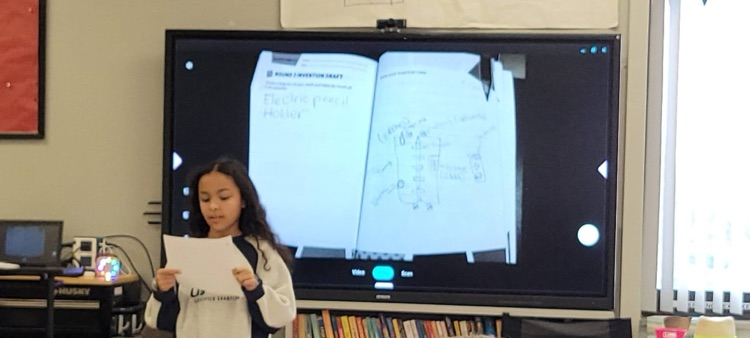 student pitching their invention