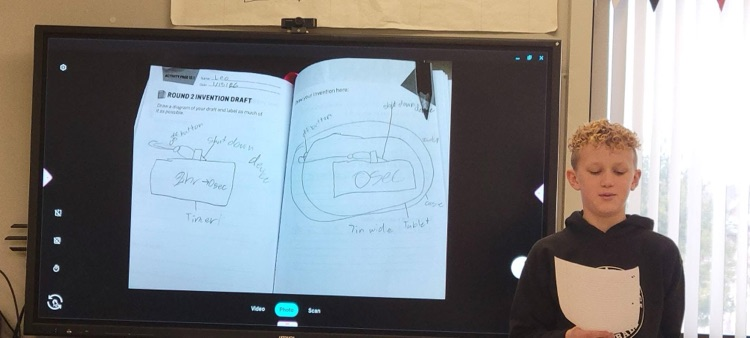 student pitching invention to class