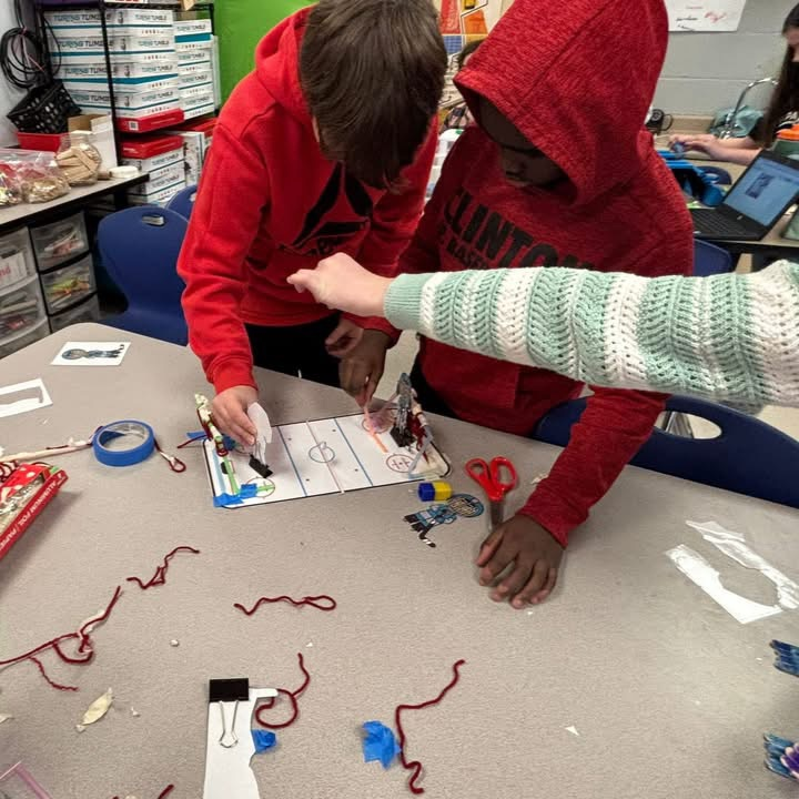 students building together 