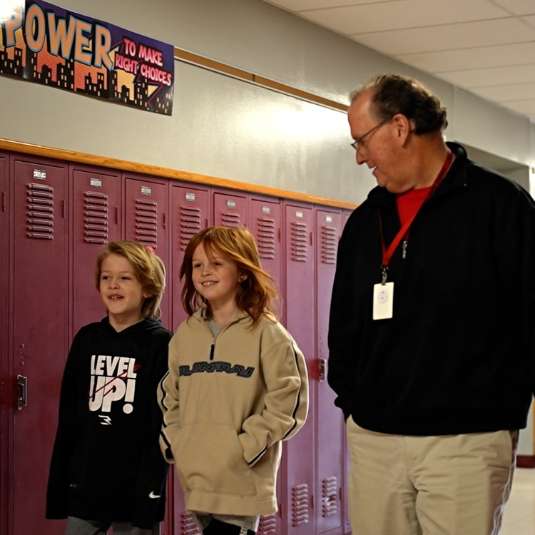 social worker walks with students