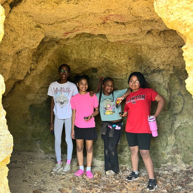 students in cave