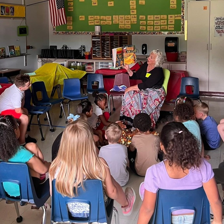 students listening to book