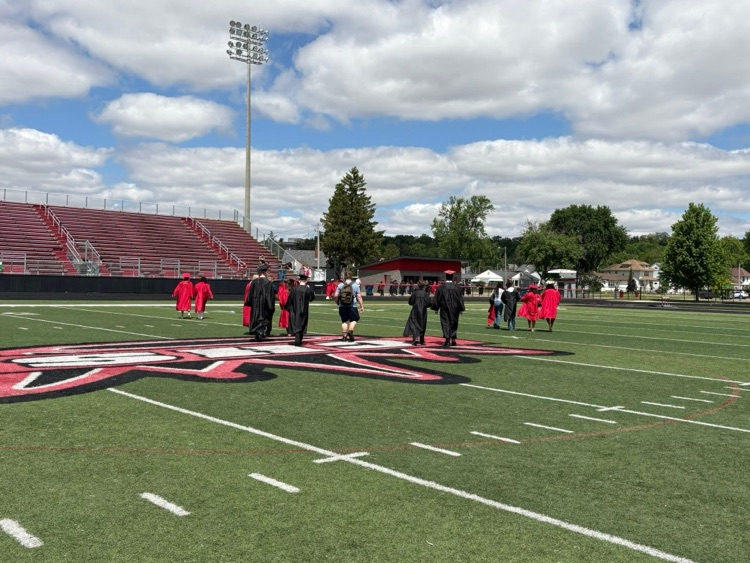 seniors on football field