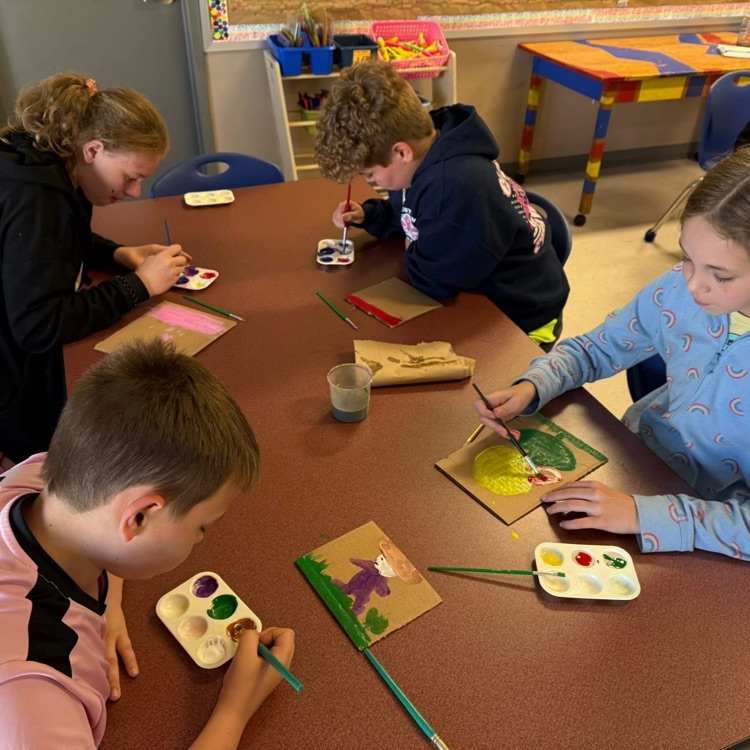 students painting
