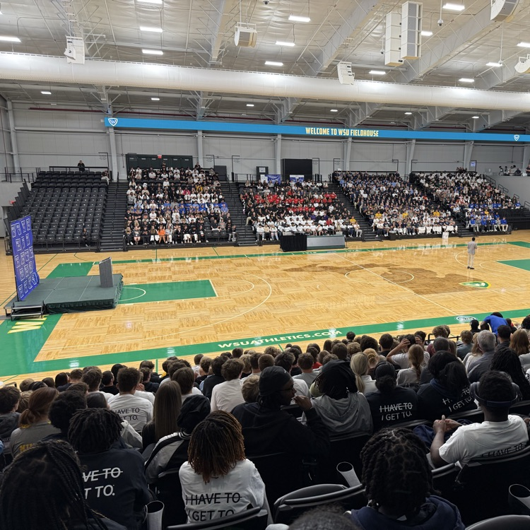 motivational speaker in a gym