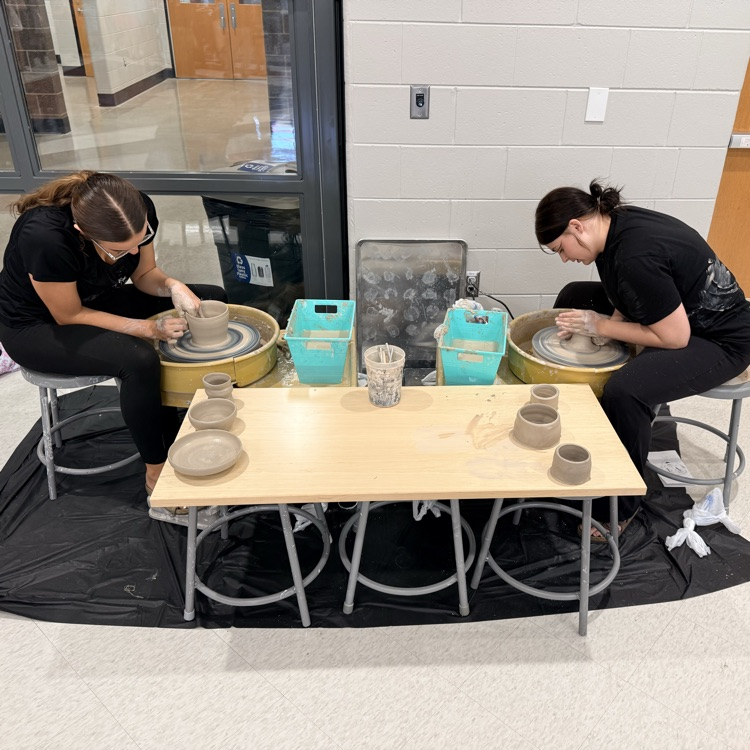 students doing clay