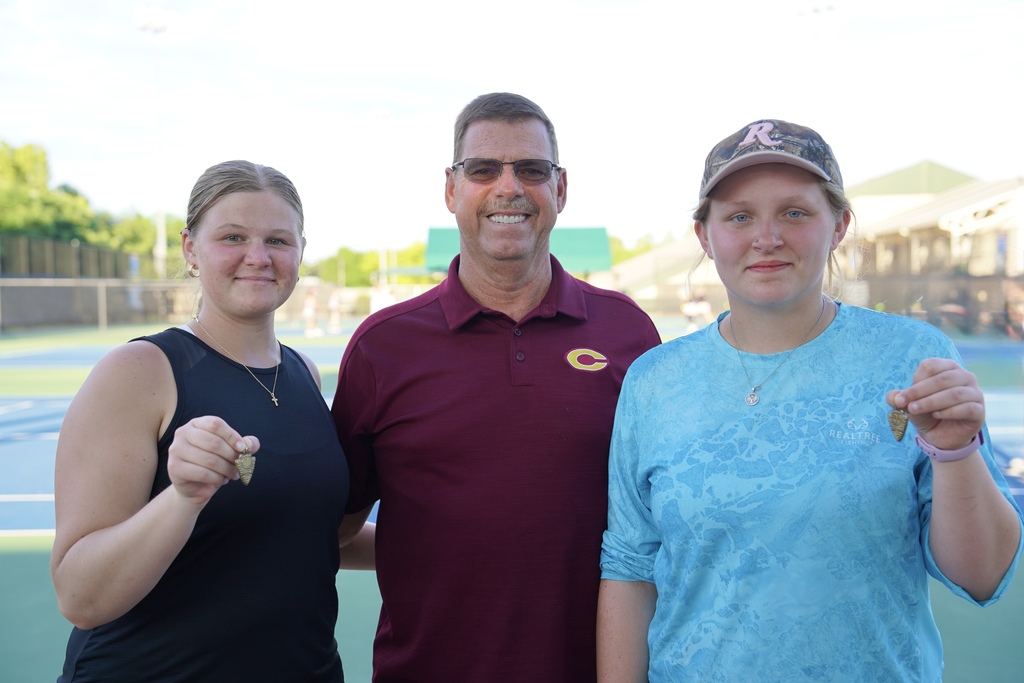 CHS Tennis players and coach
