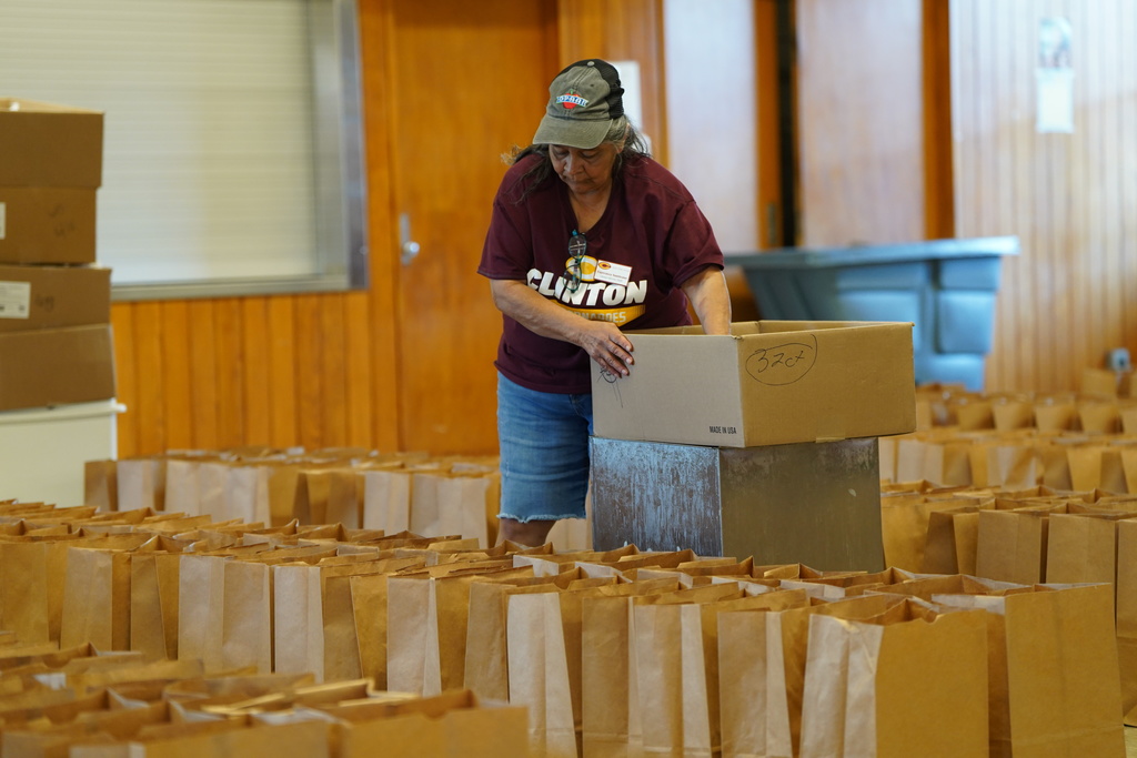 Summer lunch crew packing meals