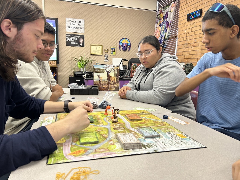 Outdoor Education students playing a board game.