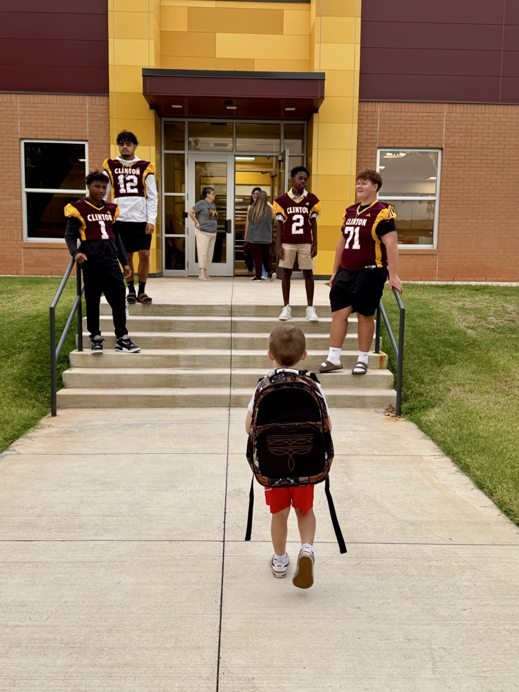 CHS Football team greeting Nance students.